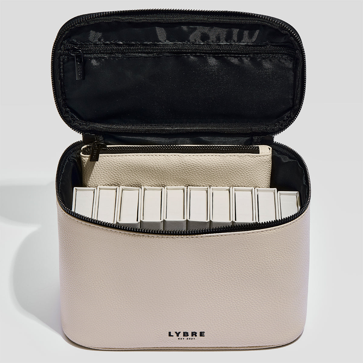 The Carry All lash train case with included pouch by Lybre Lashes — lychee-textured PVC leather beauty organizer